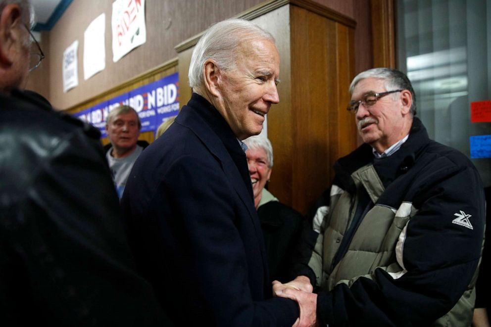 PHOTO: Democratic presidential candidate, former Vice President Joe Biden greets visitors during a visit to a campaign field office, Jan. 4, 2020, in Waterloo, Iowa.
