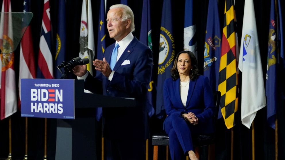 PHOTO: Democratic presidential candidate former Vice President Joe Biden, joined by his running mate Sen. Kamala Harris, D-Calif., speaks during a campaign event at Alexis Dupont High School in Wilmington, Del., Aug. 12, 2020. 