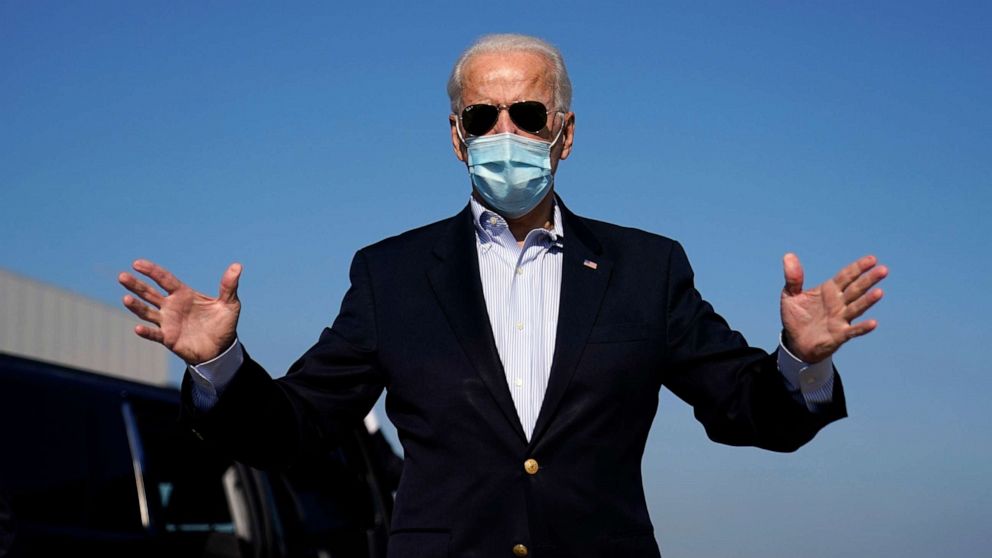 PHOTO: Democratic candidate former Vice President Joe Biden speaks to reporters at New Castle Airport in New Castle, Del., Oct. 22, 2020, en route to Nashville, Tenn., for the final presidential debate against Republican candidate President Donald Trump.