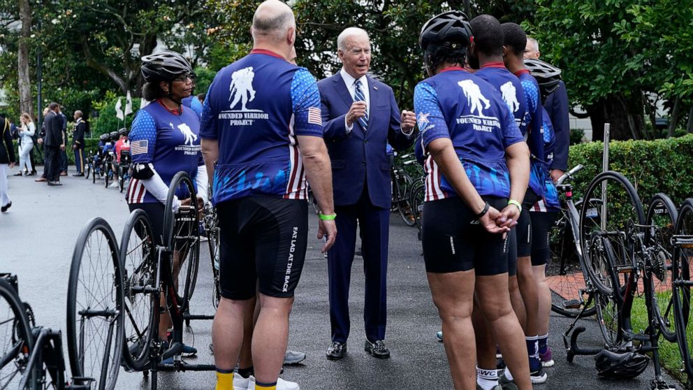 PHOTO: President Biden talks with riders in the Wounded Warrior Project Soldier Ride at the White House in Washington, June 23, 2022.