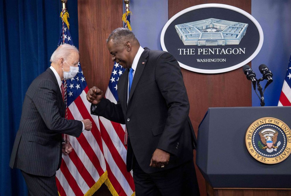 PHOTO: President Joe Biden elbow bumps U.S. Secretary of Defense Lloyd Austin as he arrives to speak during a visit to the Pentagon in Washington, D.C., Feb. 10, 2021. 