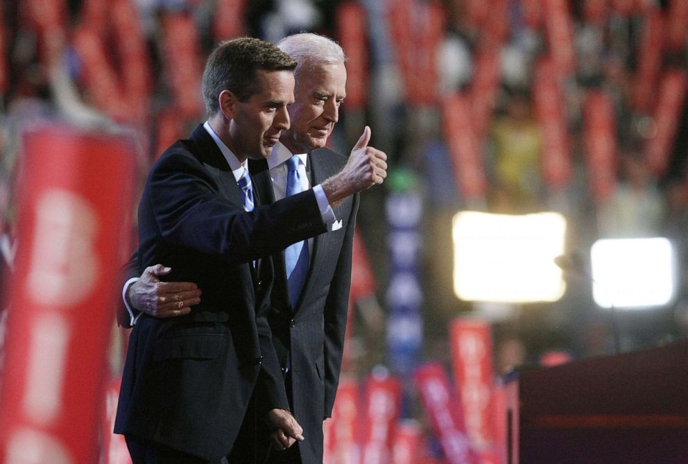 PHOTO: Delaware Attorney General Beau Biden, left, stands on the stage with his father Democratic vice-presidential nominee Sen. Joe Biden during day three of the Democratic National Convention (DNC), Aug. 27, 2008 in Denver.