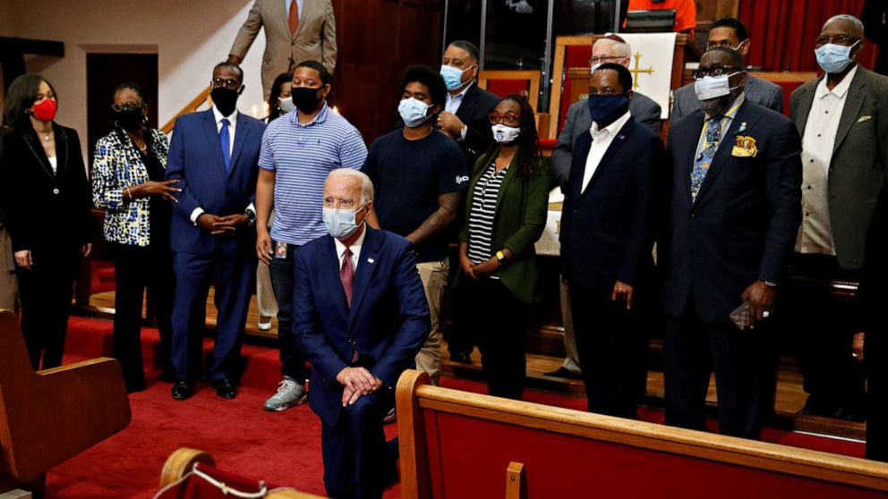 PHOTO:Democratic presidential candidate and former Vice President Joe Biden poses for a picture with Pastor of the Bethel AME Church, Rev. Dr. Silvester S. Beaman and attendees during a visit to the Bethel AME Church in Wilmington, Delaware, June 1, 2020.