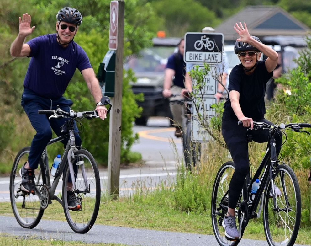 PHOTO: In this June 3, 2023, file photo, President Joe Biden and First Lady Jill Biden ride bicycles in Cape Henlopen State Park in Lewes, Delaware.