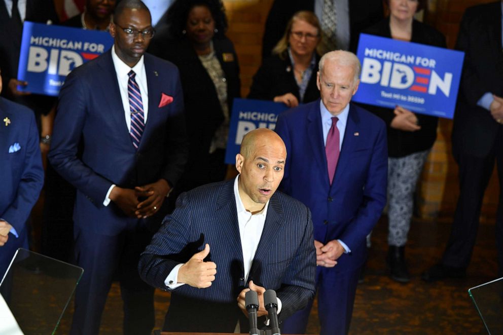 PHOTO: New Jersey Senator Cory Booker speaks as Democratic presidential candidate Joe Biden listens during a campaign stop in Flint, Mich., March 9, 2020.