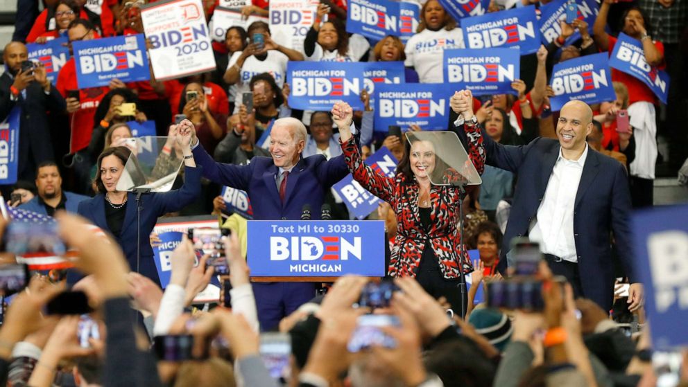 PHOTO: Left to right, Sen. Kamala Harris, former Vice President Joe Biden, Gov. Gretchen Whitmer, and Sen. Cory Booker greet the crowd during a campaign rally at Renaissance High School in Detroit, March 9, 2020.