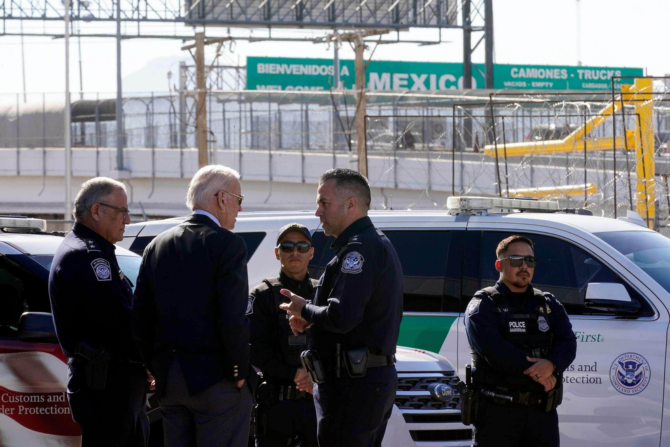 PHOTO: With the U.S.-Mexico border in the background President Joe Biden talks with U.S. Customs and Border Protection officials in El Paso Texas, Jan. 8, 2023.