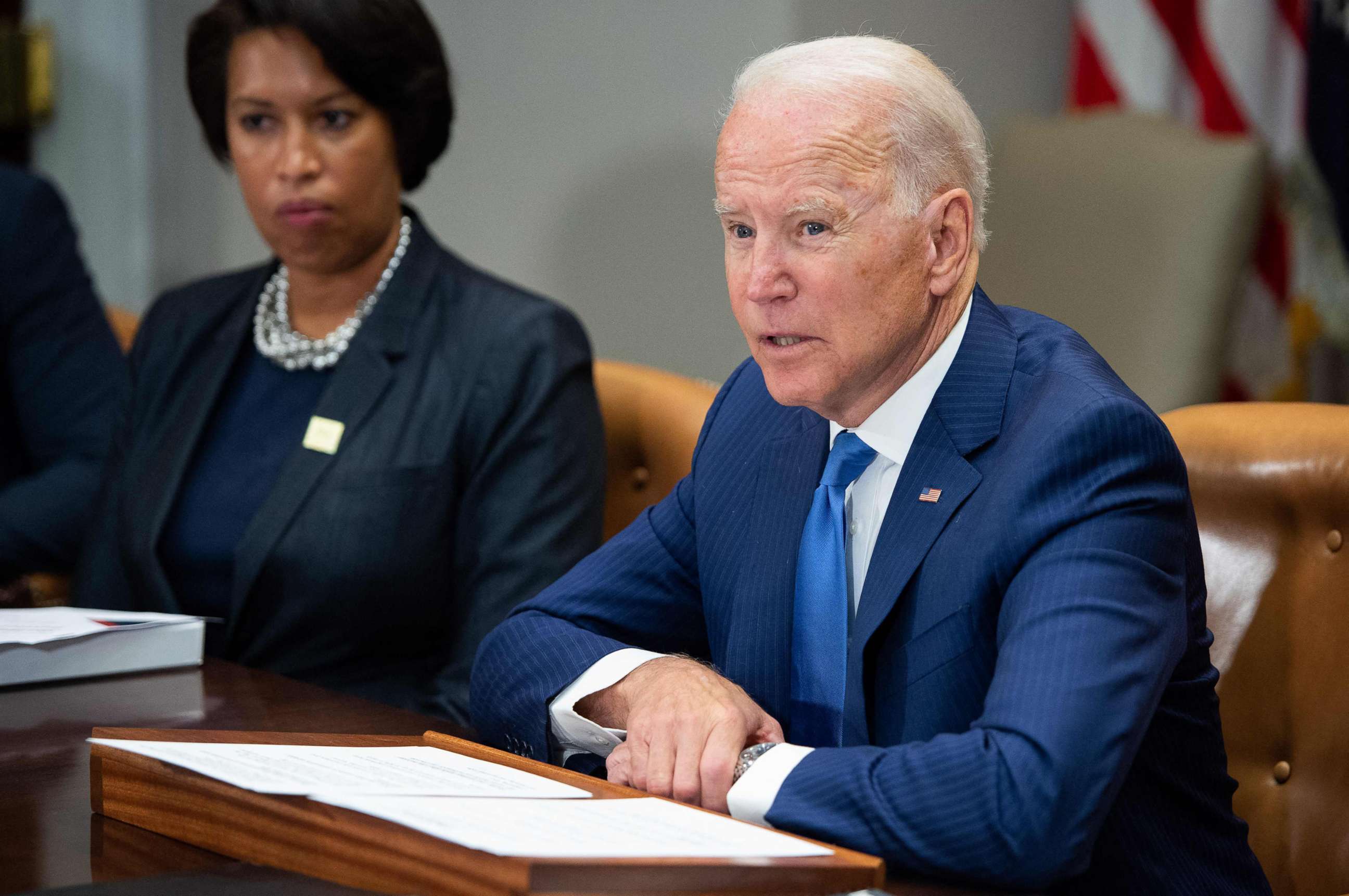 PHOTO: President Joe Biden speaks during a meeting about reducing gun violence with local leaders from around the country, including Washington, D.C., Mayor Muriel Bowser, left, in the Roosevelt Room of the White House, July 12, 2021.