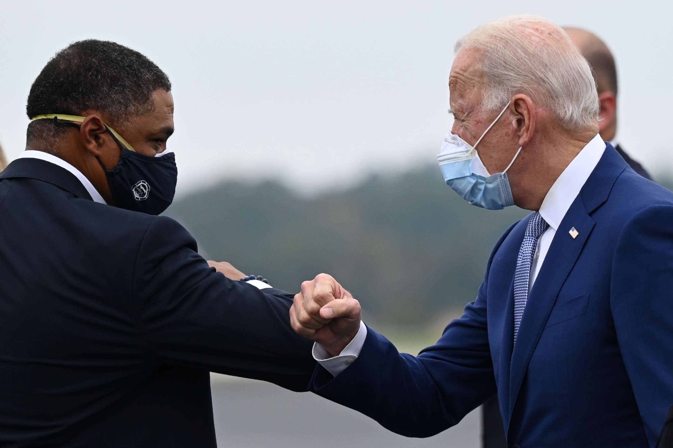 PHOTO: Democratic presidential candidate Joe Biden is greeted by Congressman Cedric Richmond as he arrives in Columbus, Ga., on Oct. 27, 2020.