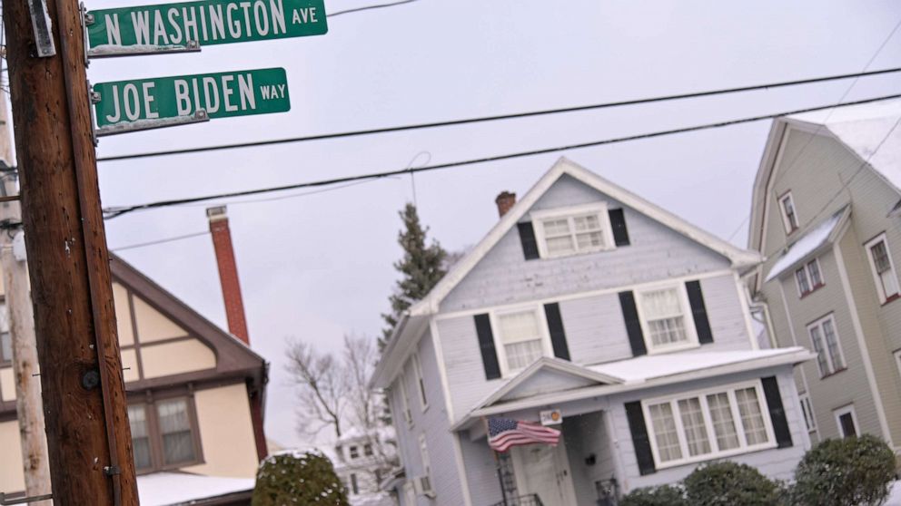 PHOTO: A view of a street sign renamed "Joe Biden Way" in front of 2446 N. Washington Ave. where President Joe Biden spent the first ten years of his Life, is seen on Jan 20, 2021 in Scranton, Pa. 