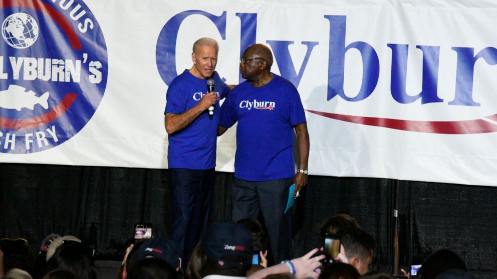 PHOTO: Former Vice President Joe Biden, left, greets House Majority Whip Jim Clyburn at the "World Famous Fish Fry" on Friday, June 21, 2019, in Columbia, S.C.