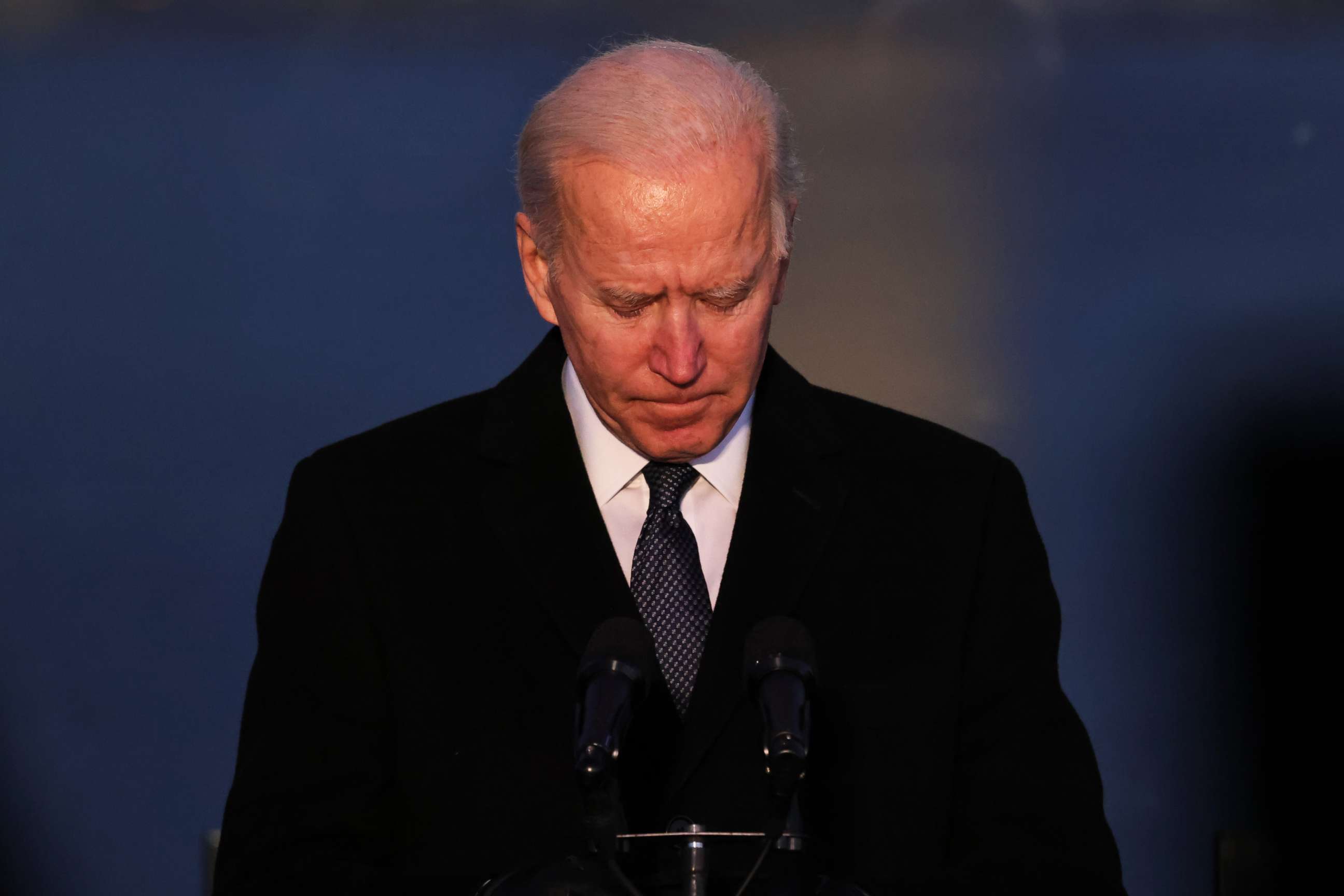 PHOTO: President-elect Joe Biden pauses as he speaks at a memorial for victims of the COVID-19 pandemic at the Lincoln Memorial on the eve of the presidential inauguration on Jan. 19, 2021, in Washington, D.C.
