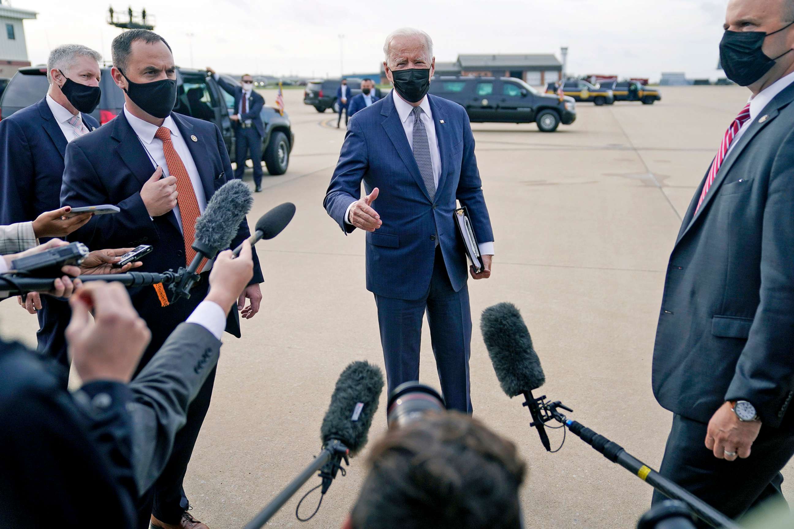 PHOTO: President Joe Biden speaks to the media before boarding Air Force One at Delaware Air National Guard Base for a trip to New Jersey to promote his "Build Back Better" agenda, Oct. 25, 2021, in New Castle, Del.