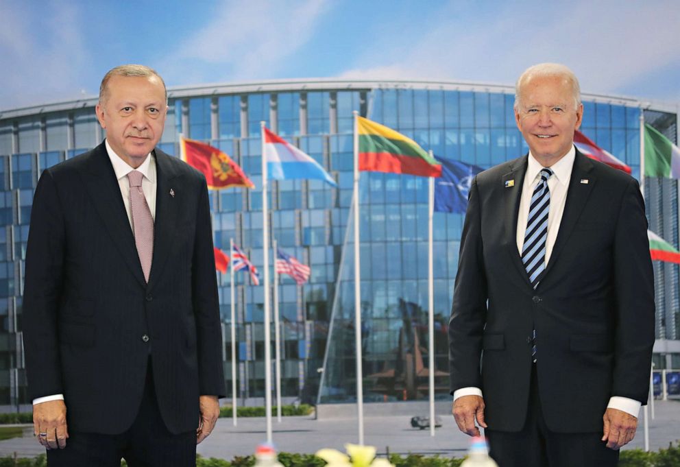 PHOTO: Turkish President Recep Tayyip Erdogan, left, and President Joe Biden pose for a photo during a meeting at the NATO summit at the North Atlantic Treaty Organization headquarters in Brussels on June 14, 2021.
