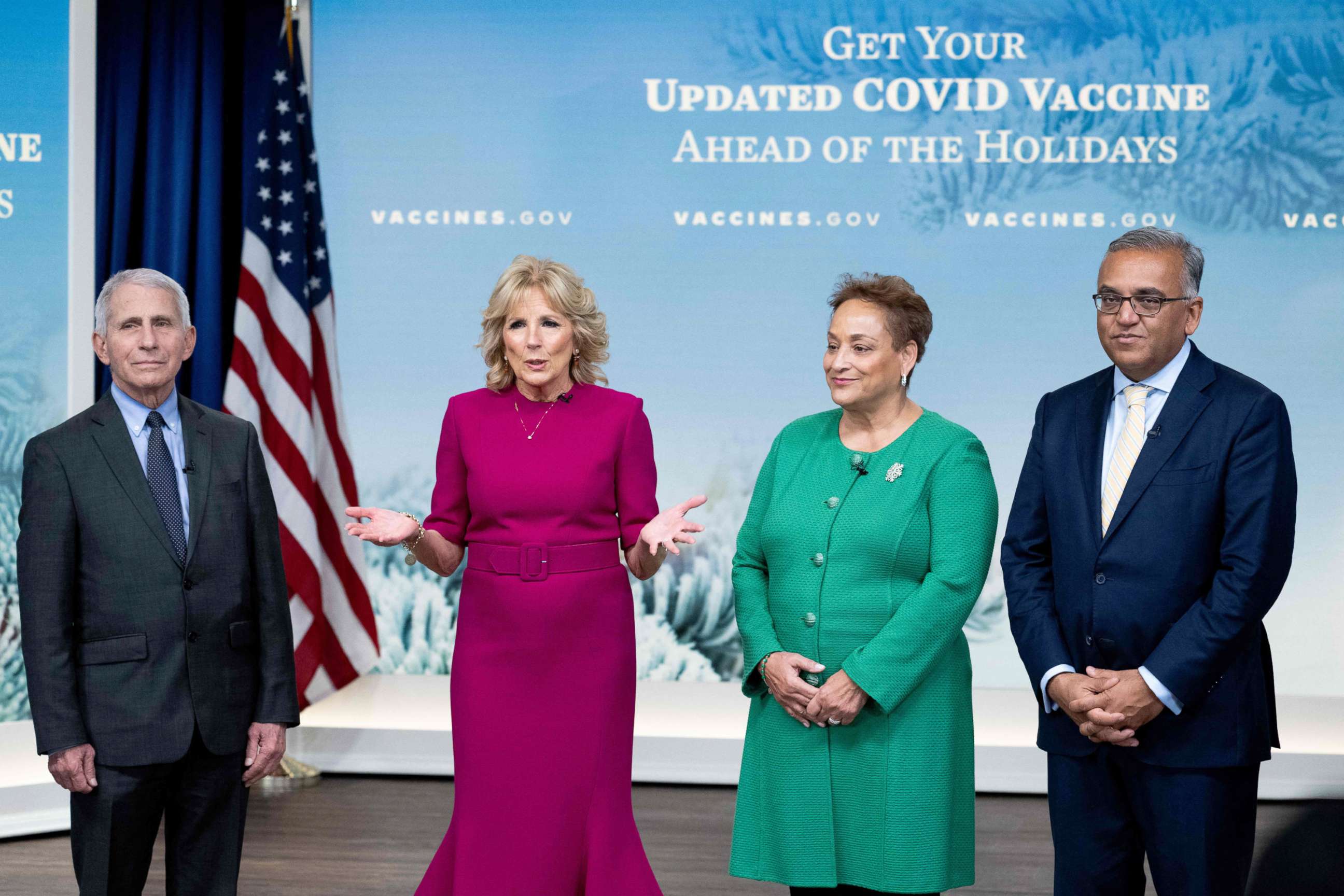 PHOTO: First Lady Jill Biden speaks about Covid vaccinations alongside Dr. Anthony Fauci, AARP CEO Jo Ann Jenkins (2nd R) and Dr. Ashish Jha (R) during a COVID-19 virtual event in the Eisenhower Executive Office Building in Washington, DC, Dec. 9, 2022. 