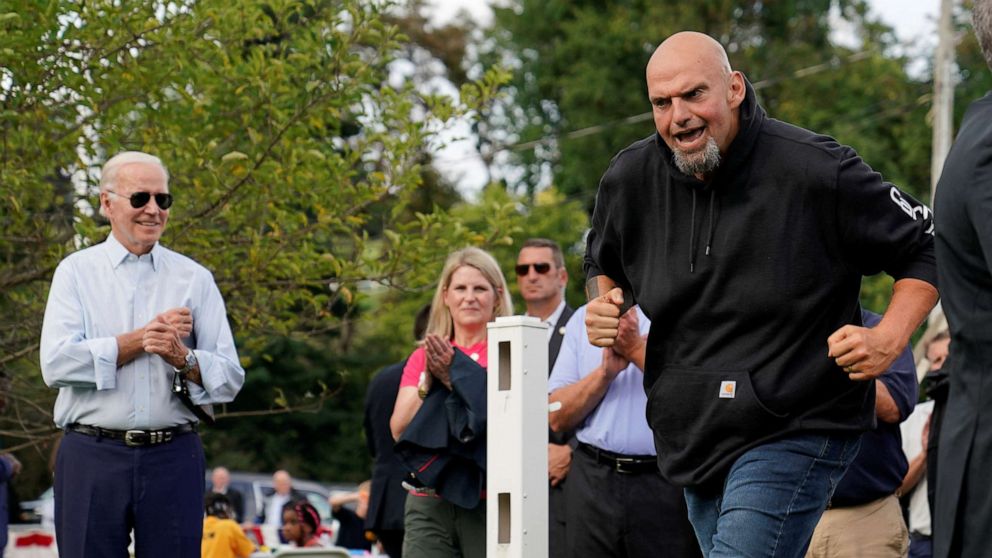 PHOTO: Pennsylvania Lieutenant Governor and U.S. Senate candidate John Fetterman gestures as President Joe Biden looks on as they attend a Labor Day celebration at the United Steelworkers of America Local Union 2227 in West Mifflin, Penn., Sept. 5, 2022.