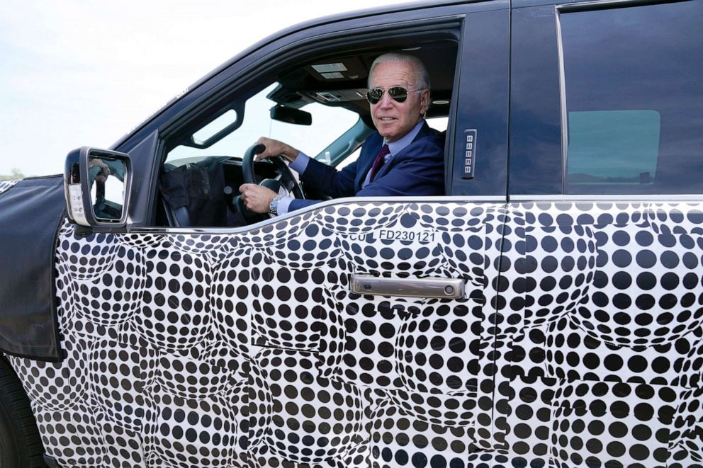 PHOTO: President Joe Biden drives a F150 Lightning electric truck at the Ford Dearborn Development Center in Dearborn, Mich., May 18, 2021.