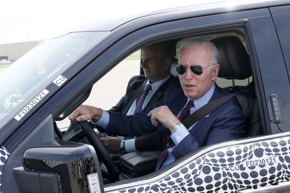 PHOTO: President Joe Biden drives a F150 Lightning electric truck at the Ford Dearborn Development Center in Dearborn, Mich., May 18, 2021.