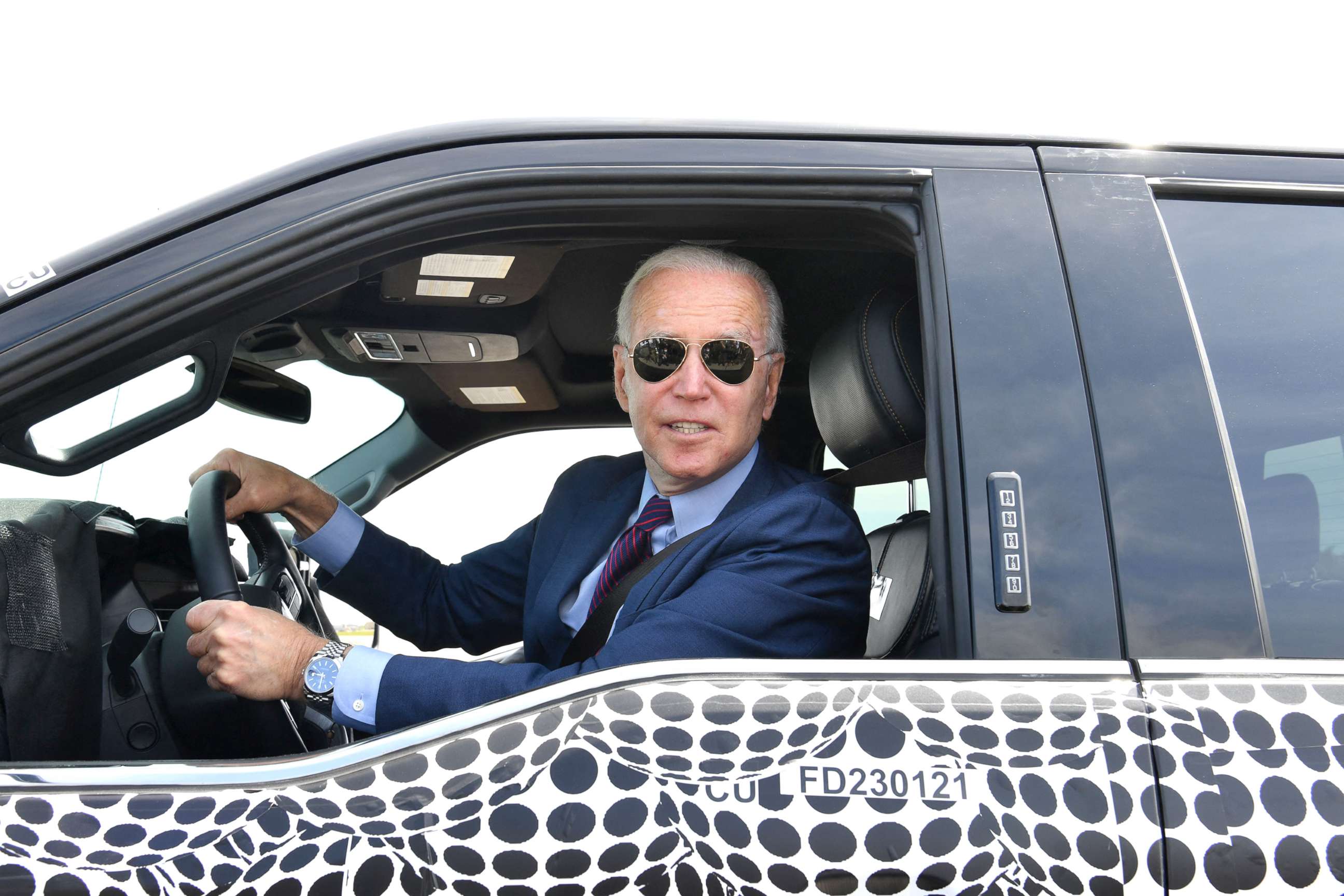 PHOTO: President Joe Biden drives a F150 electric truck at the Ford Dearborn Development Center in Dearborn, Mich., May 18, 2021. 