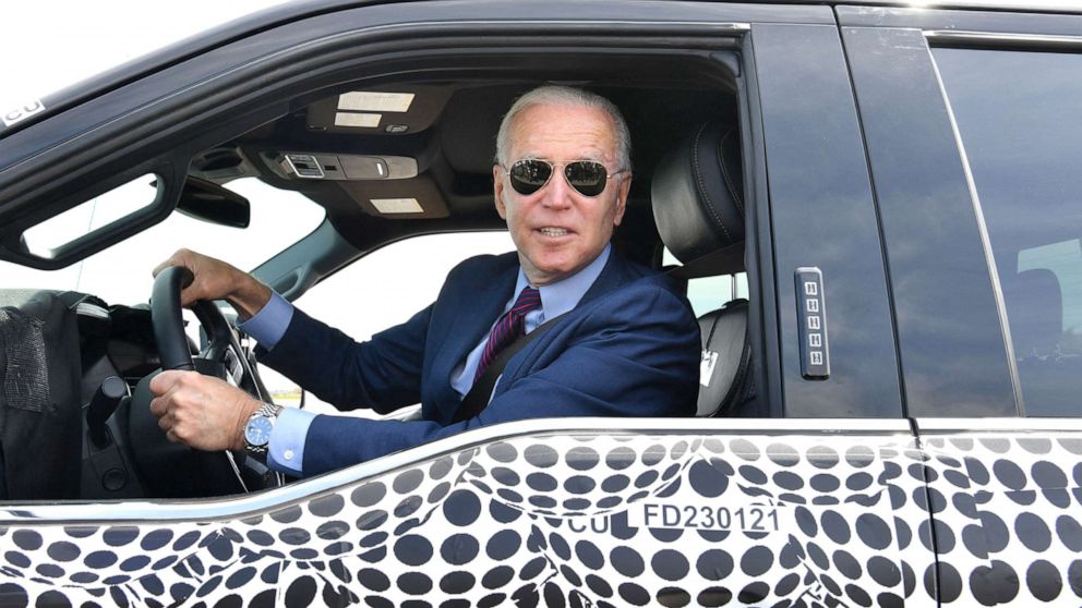 PHOTO: President Joe Biden drives a F150 electric truck at the Ford Dearborn Development Center in Dearborn, Mich., May 18, 2021. 