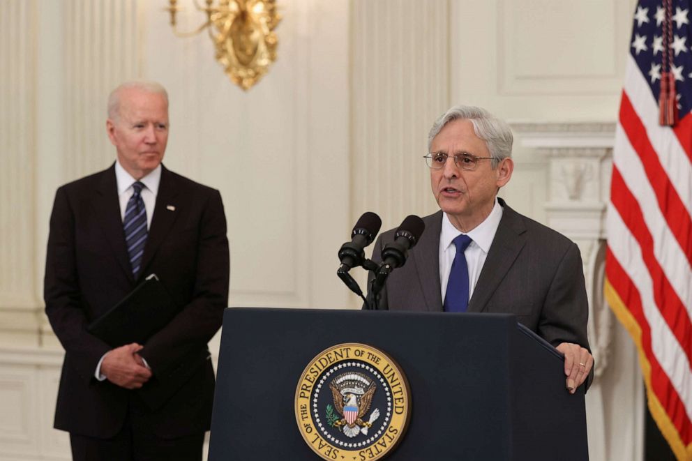 Attorney General Merrick Garland delivers remarks at the White House in Washington next to President Joe Biden after a roundtable discussion with advisers on steps to curtail U.S. gun violence on June 23, 2021.