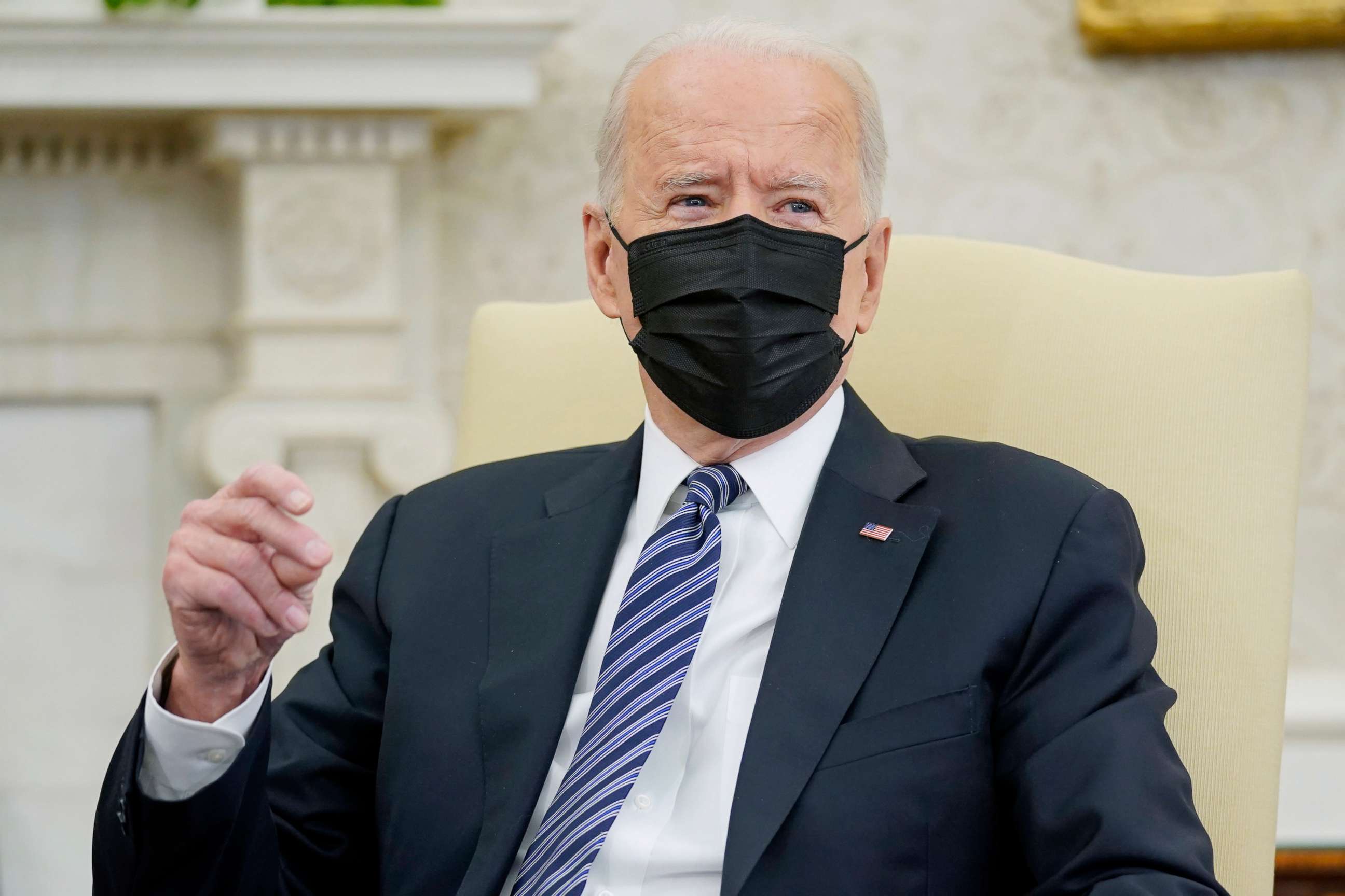 PHOTO: President Joe Biden snaps his fingers as he responds to a reporters question during a meeting with congressional leaders in the Oval Office of the White House, May 12, 2021, in Washington.