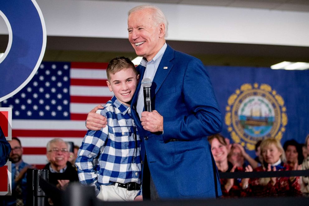 PHOTO: Democratic presidential candidate President Joe Biden hugs Brayden Harrington at a campaign stop in Gilford, N.H., Feb. 10, 2020. 