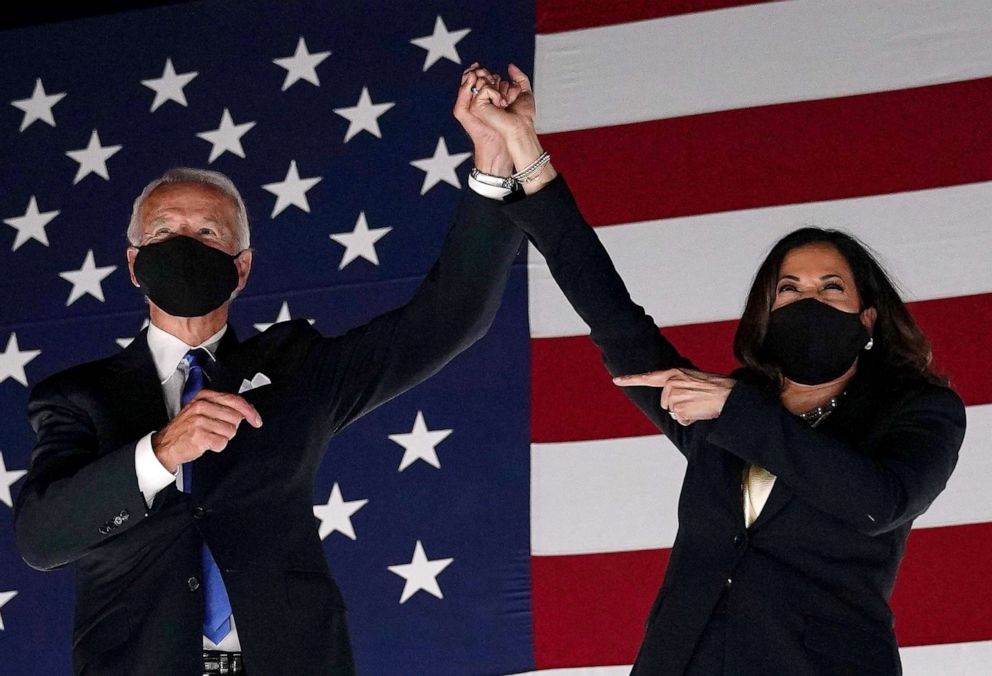 PHOTO: Democratic presidential nominee Joe Biden and vice presidential nominee Sen. Kamala Harris greet supporters outside the Chase Center in Wilmington, Del., at the conclusion of the Democratic National Convention, Aug. 20, 2020.