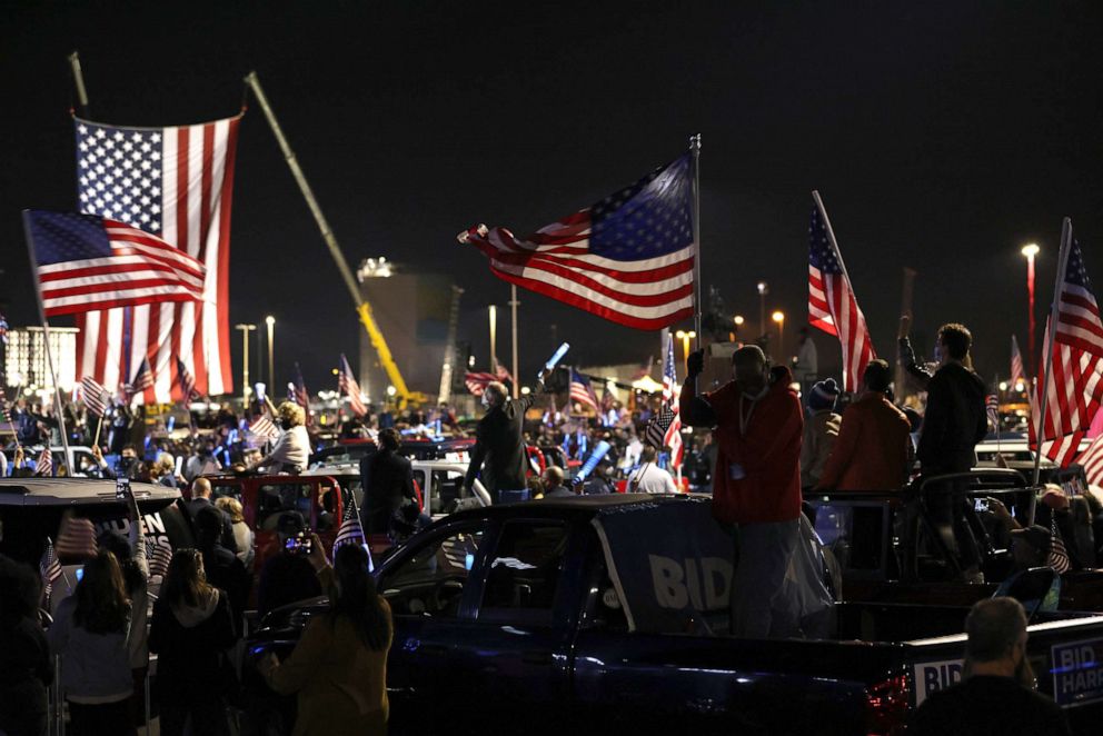 PHOTO: Supporters wait at the Chase Center for Joe Biden, who is set to become the 46th president of the United States, to address the nation Nov. 07, 2020, in Wilmington, Del.