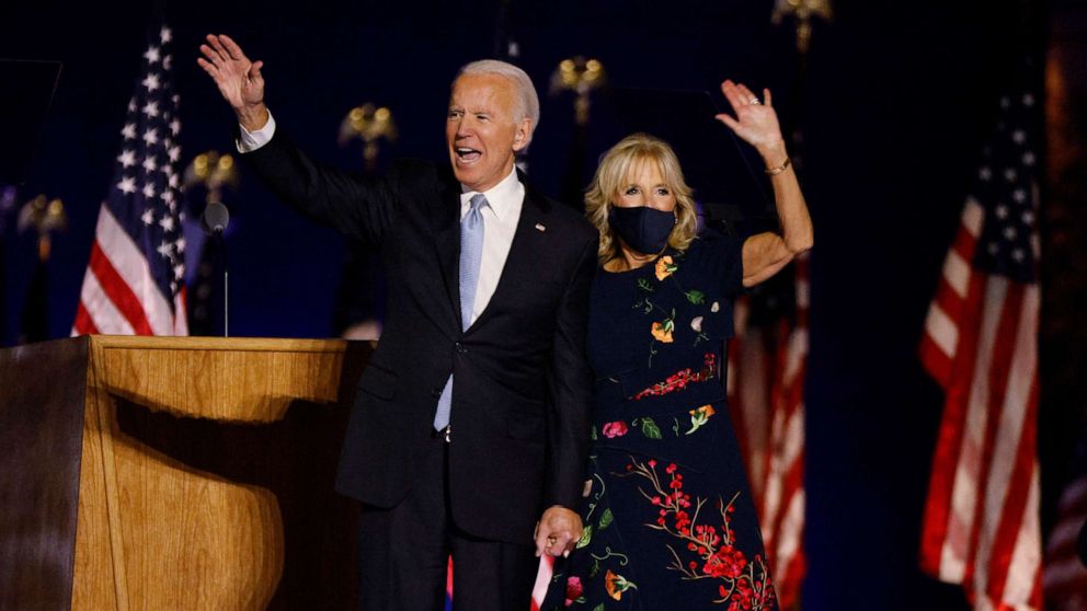 PHOTO: President-elect Joe Biden and his wife Jill wave to the crowd after speaking at his election rally, after the news media announced that Biden has won the presidential election, in Wilmington, Del., Nov. 7, 2020.