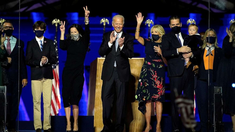 PHOTO: President-elect Joe Biden is accompanied on the stage by his wife Jill, and members of their family, after speaking in Wilmington, Del., Nov. 7, 2020.