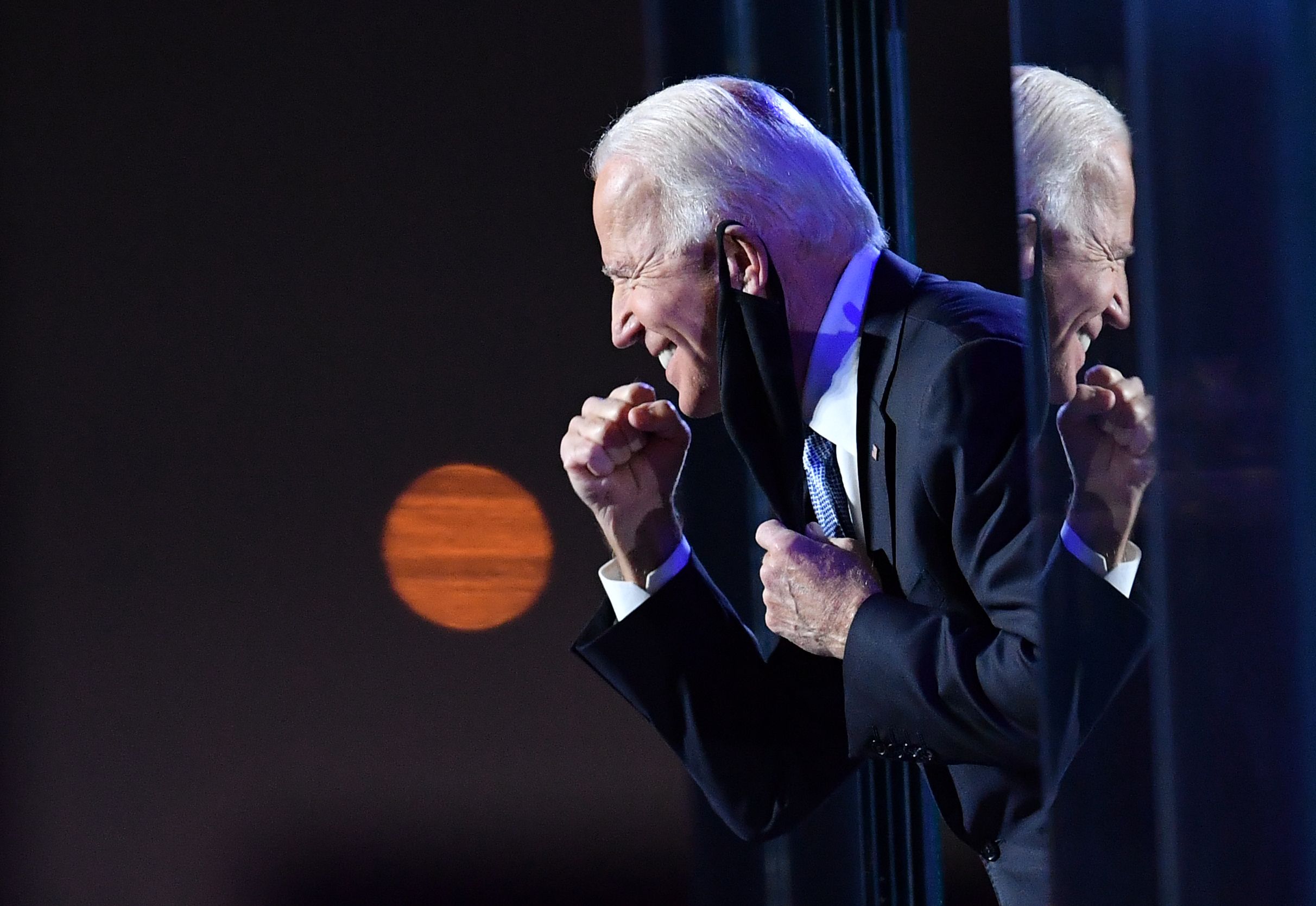 PHOTO: President-elect Joe Biden gestures to the crowd after he delivered remarks in Wilmington, Del., Nov. 7, 2020.