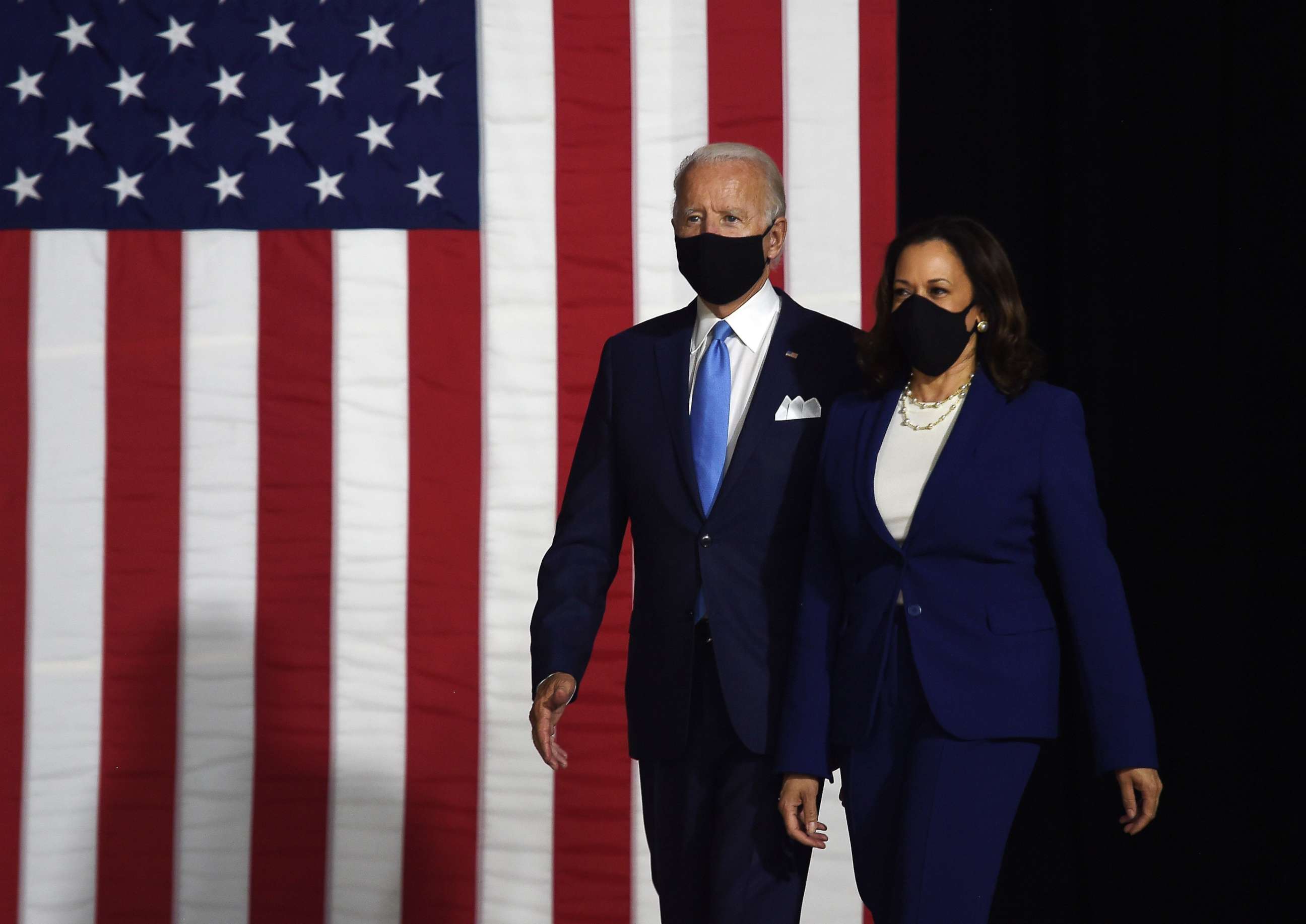 PHOTO: Democratic presidential nominee and former Vice President Joe Biden and vice presidential running mate, Sen. Kamala Harris arrive to conduct their first press conference together in Wilmington, Del. on Aug.12, 2020.