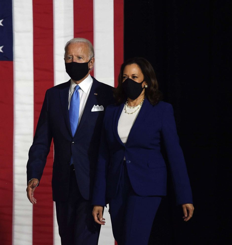 PHOTO: Democratic presidential nominee and former Vice President Joe Biden and vice presidential running mate, Sen. Kamala Harris arrive to conduct their first press conference together in Wilmington, Del. on Aug.12, 2020.