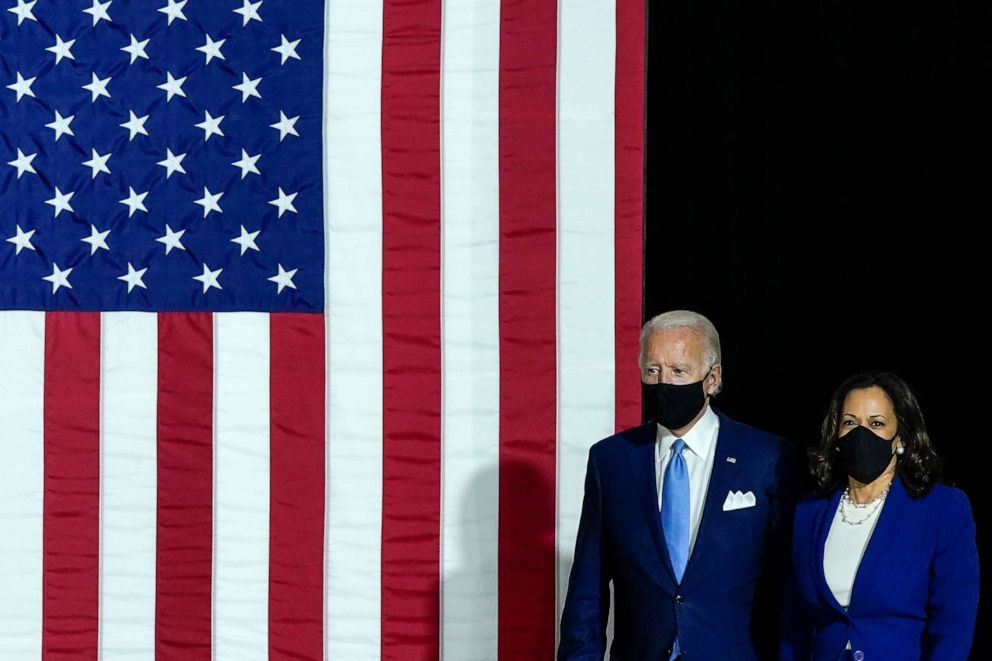 PHOTO: Presumptive Democratic presidential nominee former Vice President Joe Biden and his running mate Sen. Kamala Harris deliver remarks at the Alexis Dupont High School, Aug. 12, 2020, in Wilmington, Delaware.