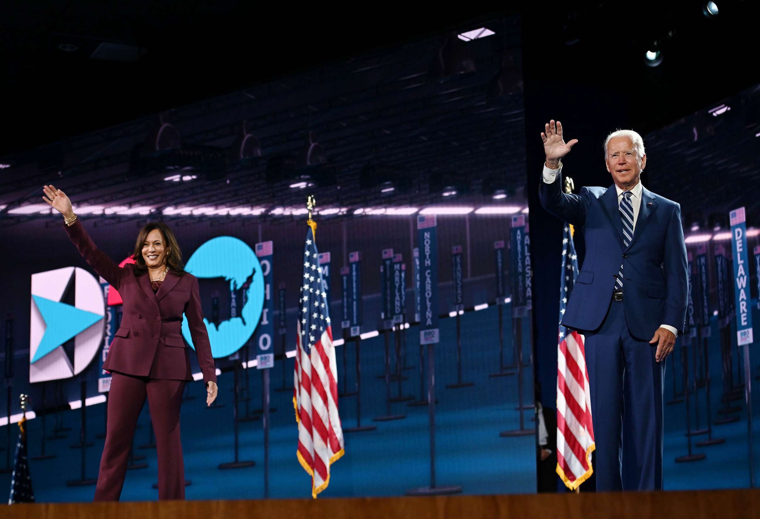 PHOTO: Sen. Kamala Harris and former Vice President Joe Biden wave from the stage at the end of the third day of the Democratic National Convention, in Wilmington, Del., Aug. 19, 2020.