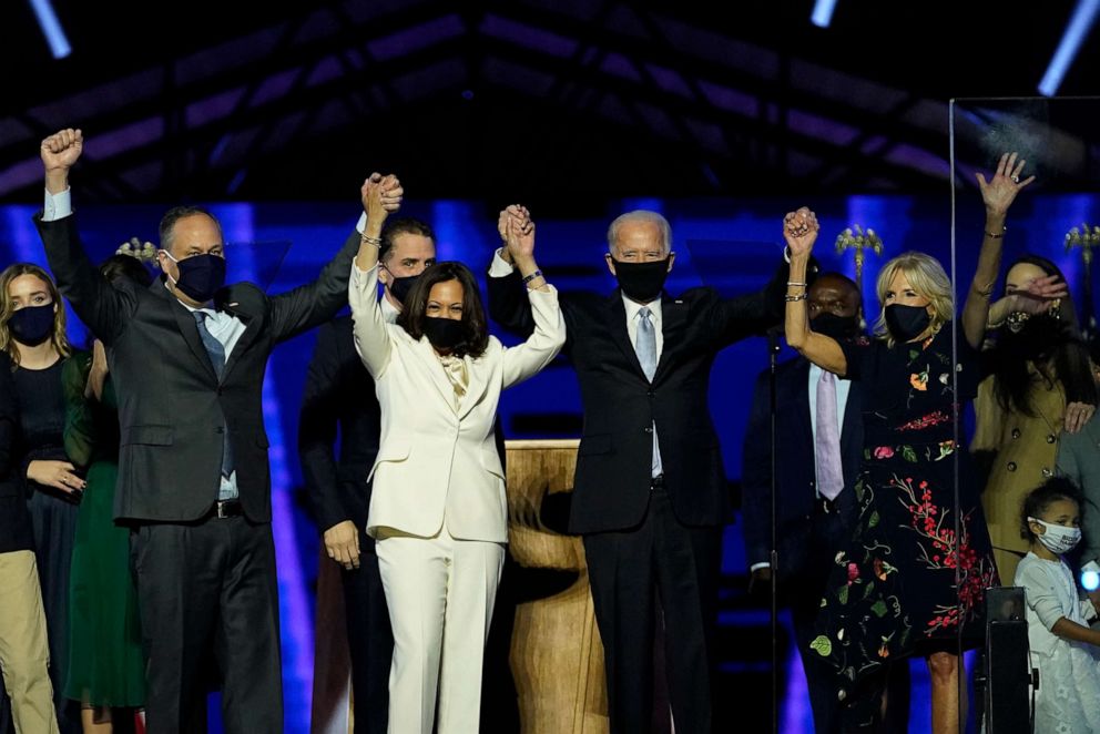 PHOTO: From left, Doug Emhoff, husband of Vice President-elect Kamala Harris, Harris, President-elect Joe Biden and his wife Jill Biden on stage together, Nov. 7, 2020, in Wilmington, Del.