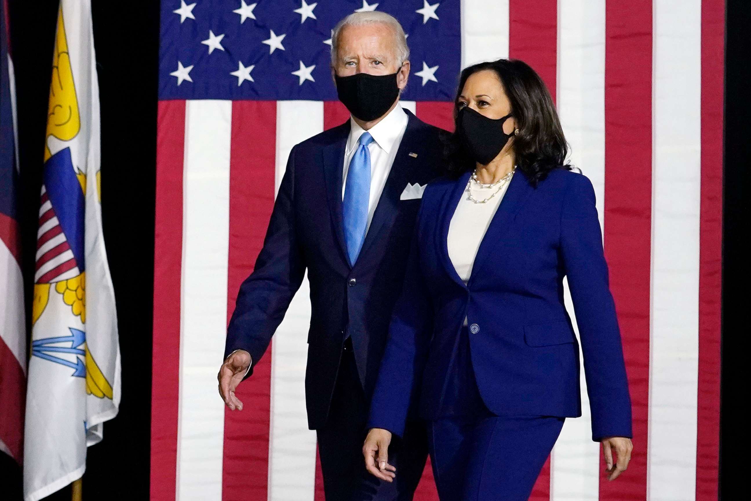 PHOTO: Democratic presidential candidate former Vice President Joe Biden and his running mate Sen. Kamala Harris arrive to speak at a news conference at Alexis Dupont High School in Wilmington, Del., Aug. 12, 2020.