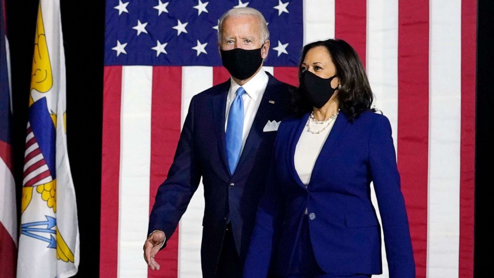 PHOTO: Democratic presidential candidate former Vice President Joe Biden and his running mate Sen. Kamala Harris arrive to speak at a news conference at Alexis Dupont High School in Wilmington, Del., Aug. 12, 2020.