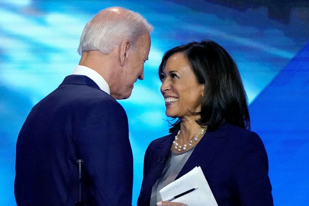 PHOTO: Former Vice President Joe Biden talks with Senator Kamala Harris after the conclusion of the 2020 Democratic U.S. presidential debate in Houston, Sept. 12, 2019. 