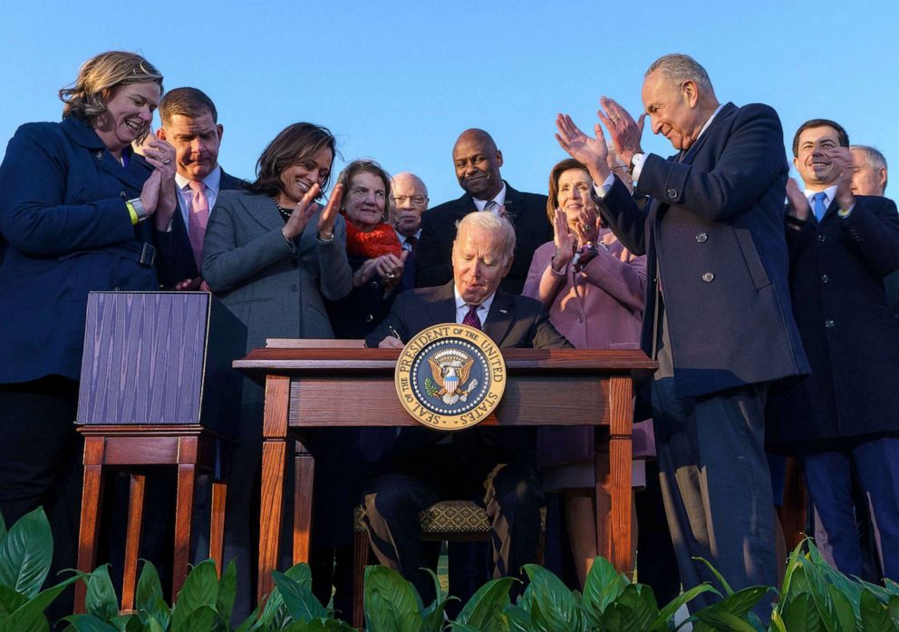 PHOTO: President Joe Biden takes part in a signing ceremony for H.R. 3684, the Infrastructure Investment and Jobs Act on the South Lawn of the White House,  Nov. 15, 2021.