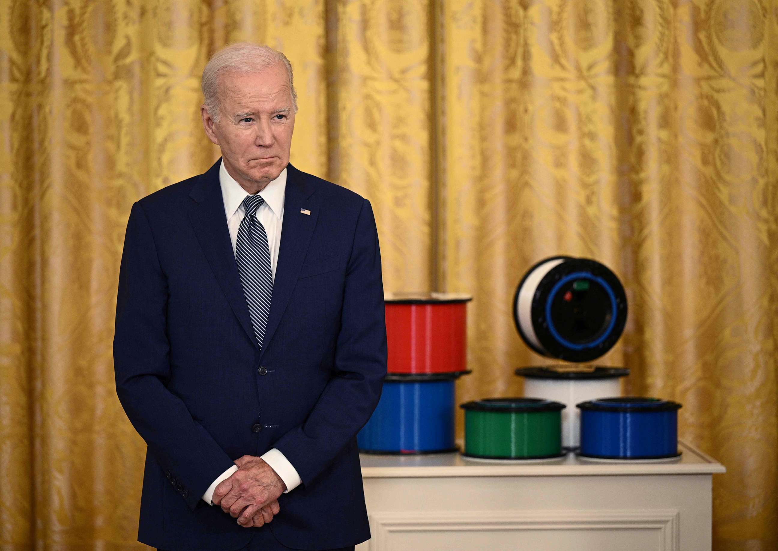 PHOTO: President Joe Biden looks on during a high-speed internet infrastructure announcement in the East Room of the White House, June 26, 2023.