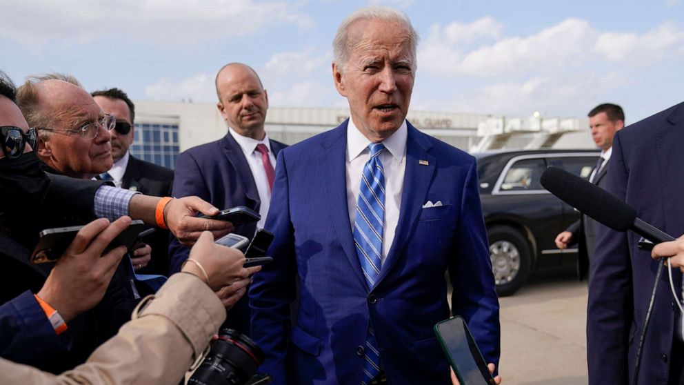 PHOTO: President Joe Biden speaks to reporters before boarding Air Force One at Des Moines International Airport, in Des Moines, Iowa, on April 12, 2022, en route to Washington, D.C.