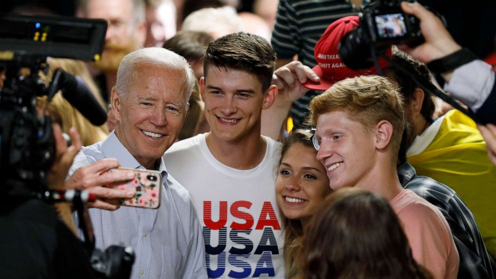 PHOTO: Democratic presidential candidate and former Vice President Joe Biden poses for a photo with audience members during a community event, July 17, 2019, in Council Bluffs, Iowa.