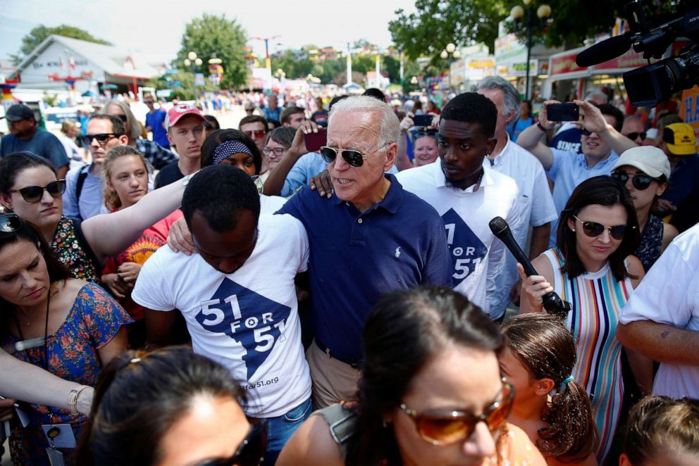 PHOTO: Democratic presidential candidate and former Vice President Joe Biden greets people at the Iowa State Fair in Des Moines, Iowa, Aug. 8, 2019.