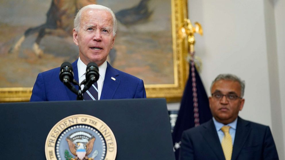 PHOTO: President Joe Biden, left, standing with White House COVID-19 Response Coordinator Ashish Jha, right, speaks about the newly approved COVID-19 vaccines for children under 5, June 21, 2022, at the White House.