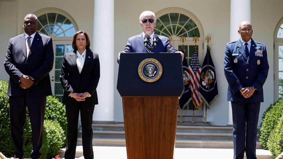 PHOTO: President Joe Biden is flanked by U.S. Defense Secretary Lloyd Austin, Vice President Kamala Harris and Air Force Gen. Charles Brown, Jr., during an event in the Rose Garden at the White House in Washington, D.C.., May 25, 2023.