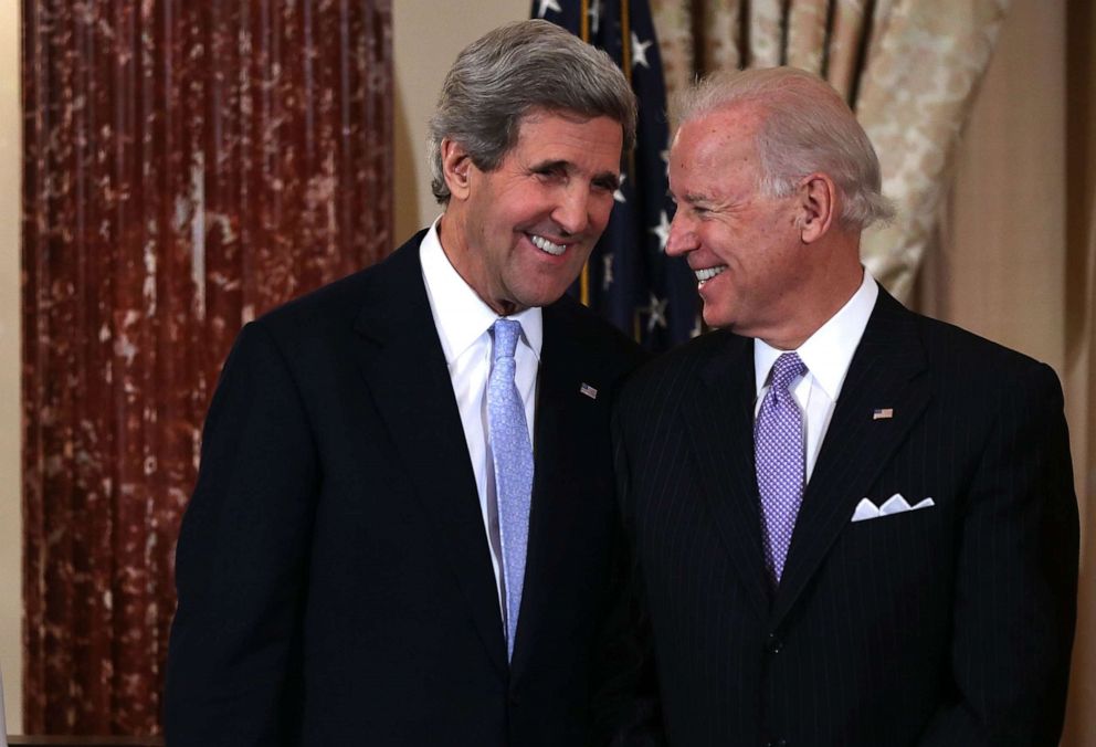 PHOTO: Secretary of State John Kerry and Vice President Joe Biden share a moment during Kerry's ceremonial swearing in at the State Department February 6, 2013, in Washington, DC.