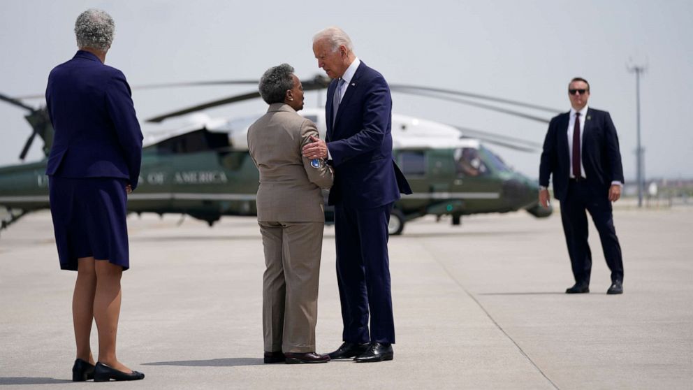 PHOTO: President Joe Biden is greeted by Cook County Board of Commissioners President Toni Preckwinkle, left, and Chicago Mayor Lori Lightfoot at O'Hare International Airport, July 7, 2021, in Chicago.