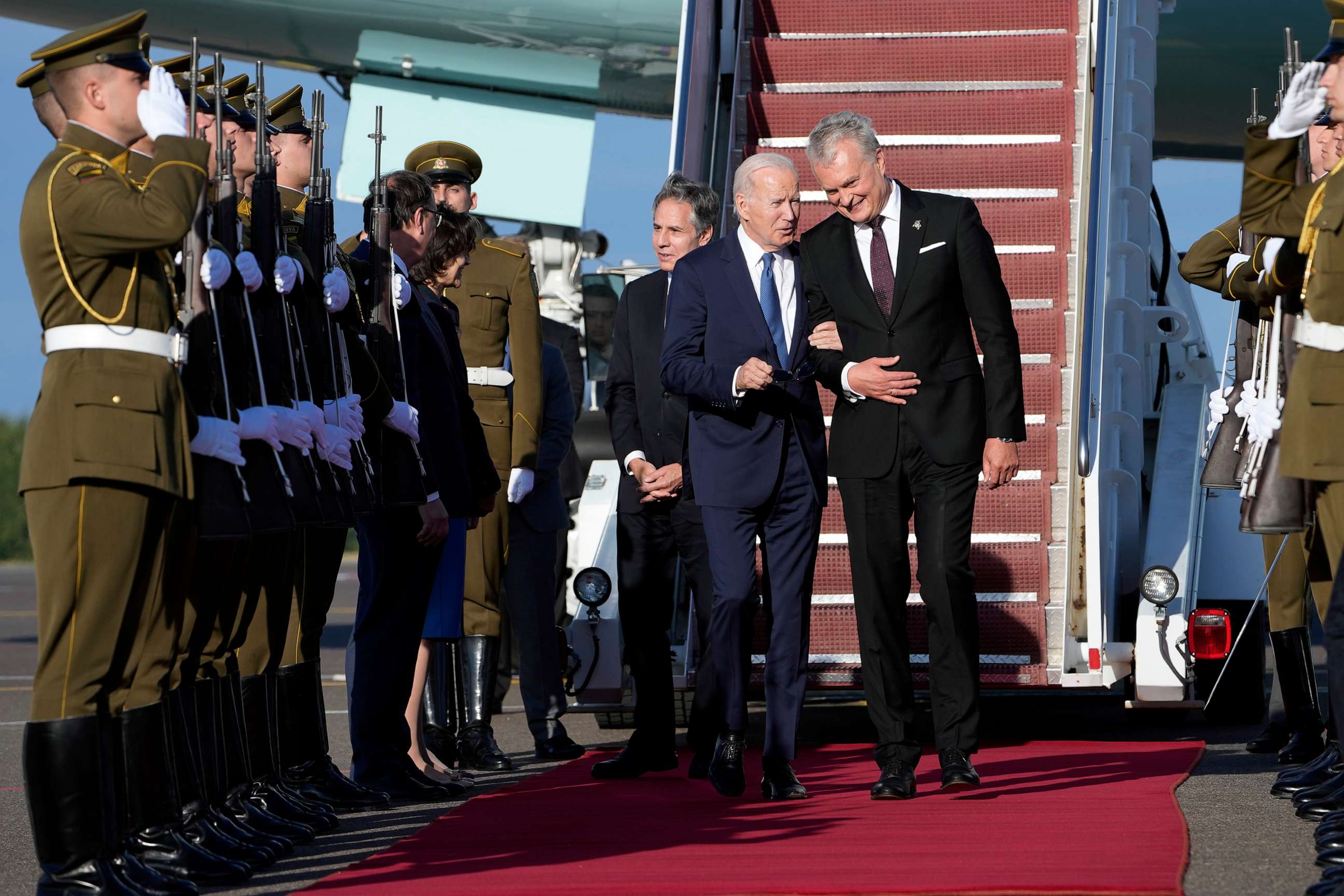 PHOTO: President Joe Biden talks with Lithuania's President Gitanas Nauseda as he arrives at Vilnius airport ahead of a NATO summit in Vilnius, Lithuania, July 10, 2023.
